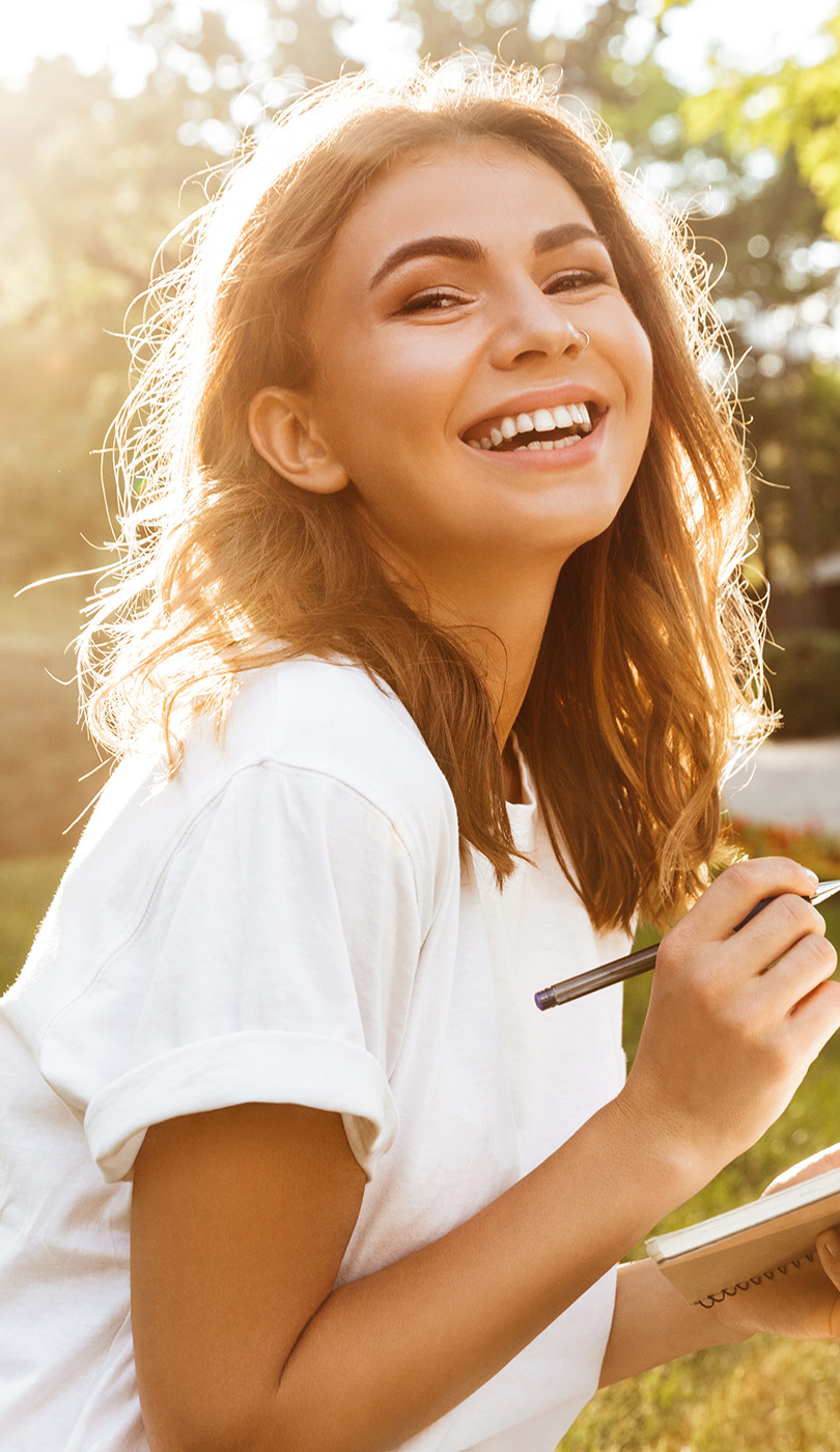 The image shows a modern dental or medical office interior with a dental chair, equipment, and a clean, professional environment.